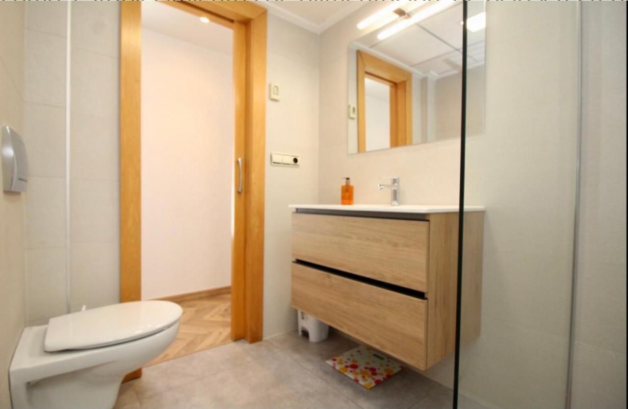 Lujoso apartamento en 1ª línea recién reformado Santa Pola Esterno foto